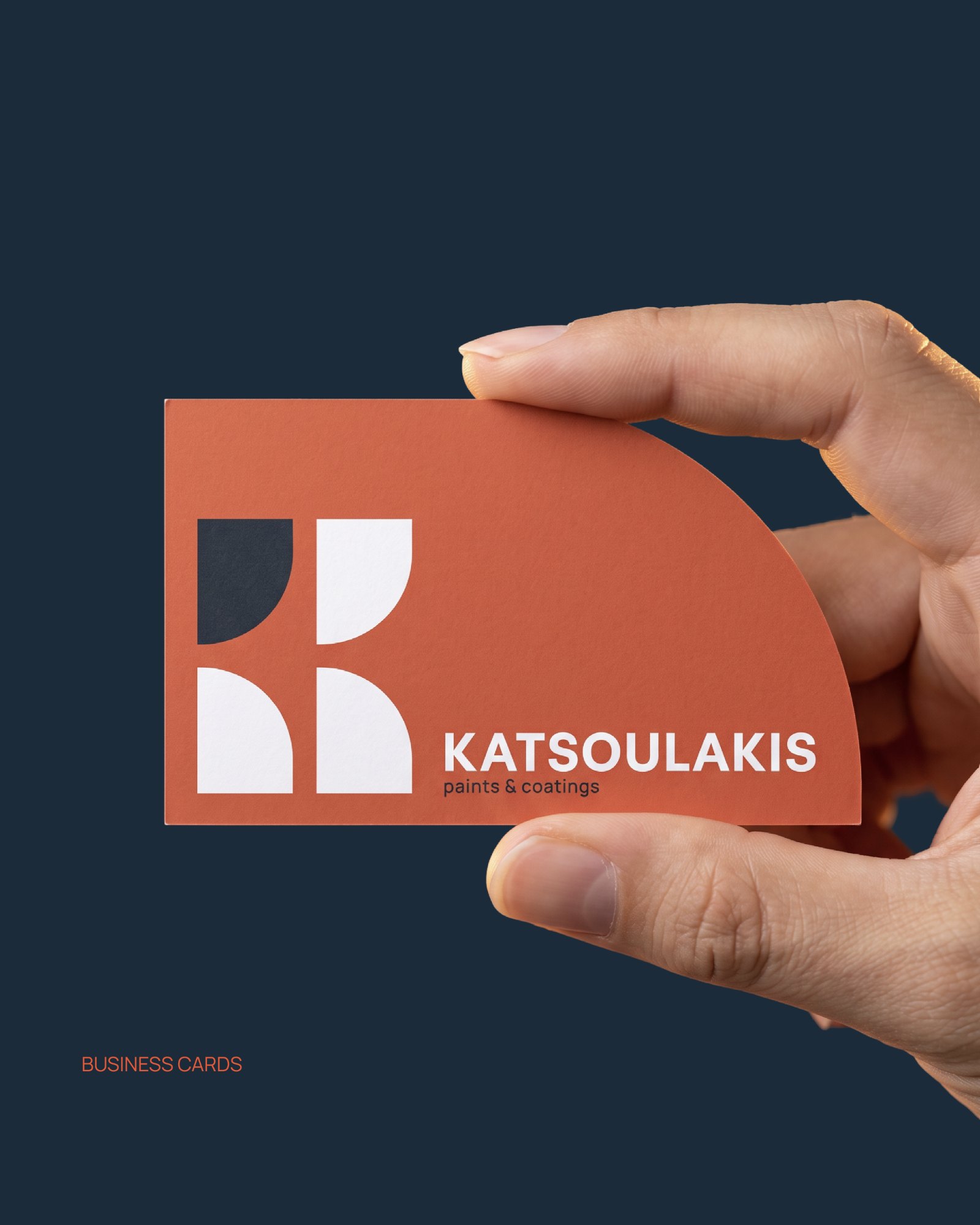 Πορτοκαλί επαγγελματική κάρτα Katsoulakis με καμπύλη κοπή